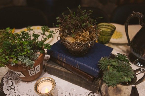 Centerpieces at a woodsy rustic chic wedding