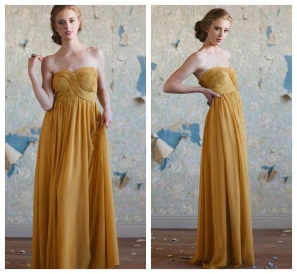 A gold long bridesmaid dress for a rustic or vintage style wedding