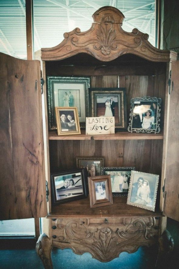 A bookcase is used as a display item at a wedding