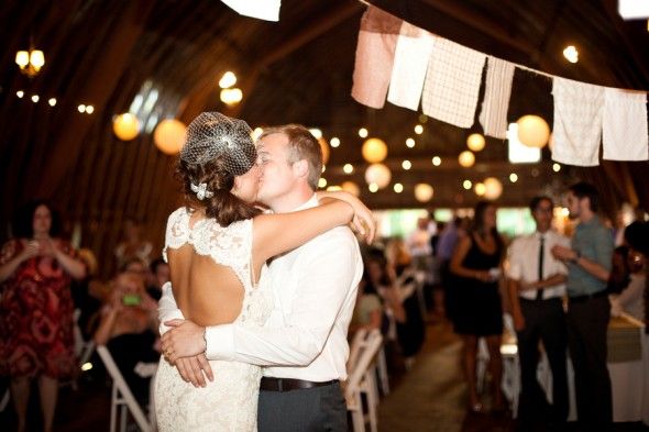 A couple dances at their barn wedding in Michigan 