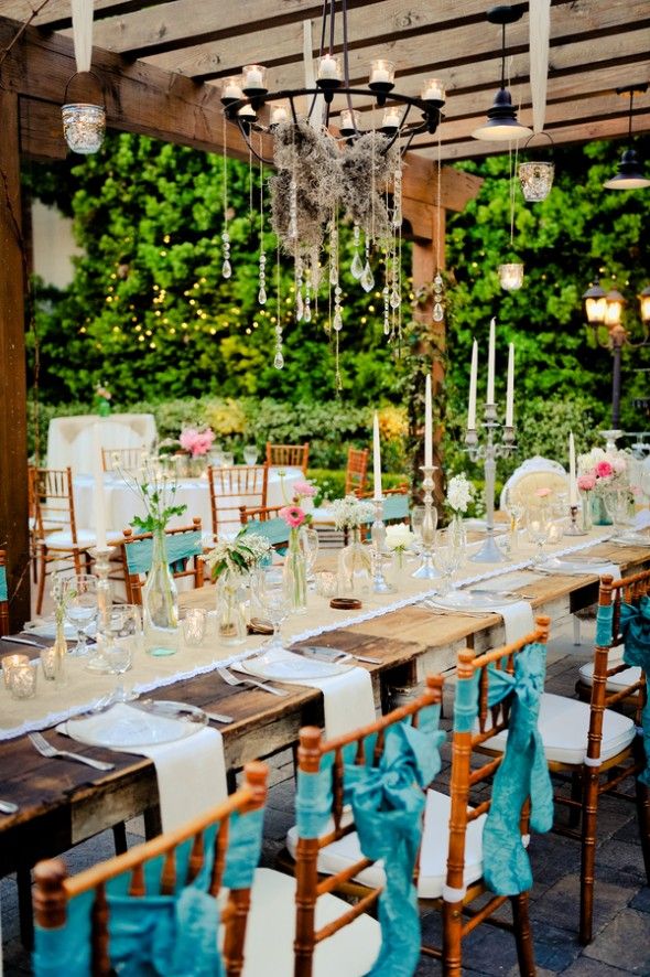 Long farm style tables at wedding