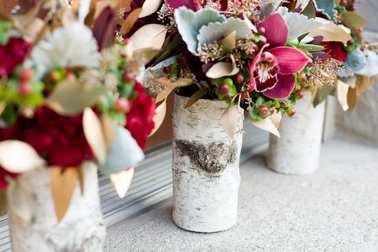 Rustic wedding flowers in birch vases