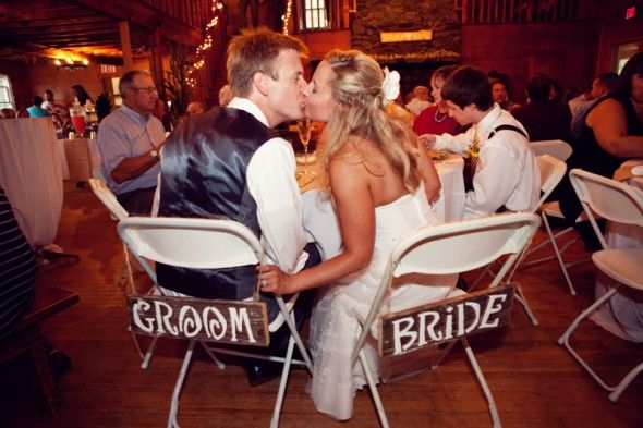 Rustic wood bride and groom signs