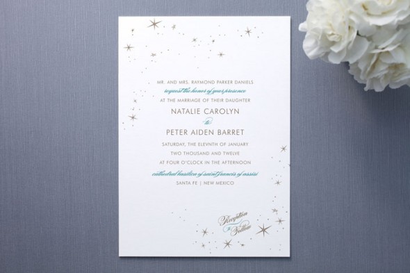 A wedding invitation with starts for a winter wedding