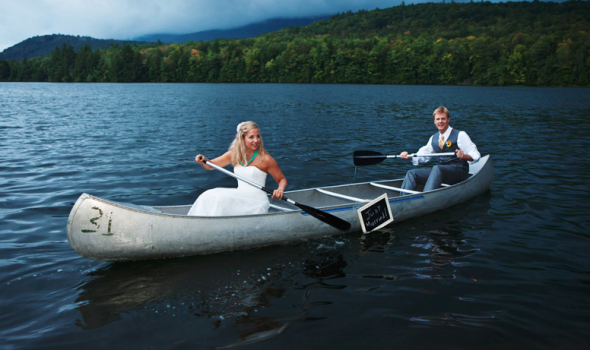 bride and groom in canoe