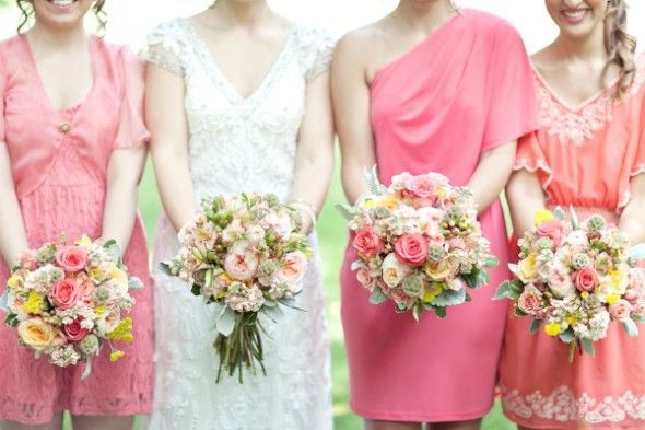 Different color bridesmaid dresses at a vintage style wedding
