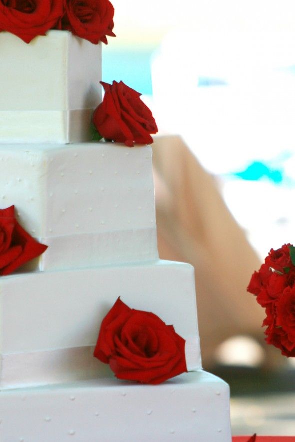 White Wedding Cake With Red Roses