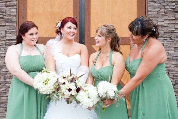 Mint green bridesmaid dresses at a country wedding