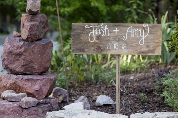 We love a good wood welcome sign at a rustic wedding