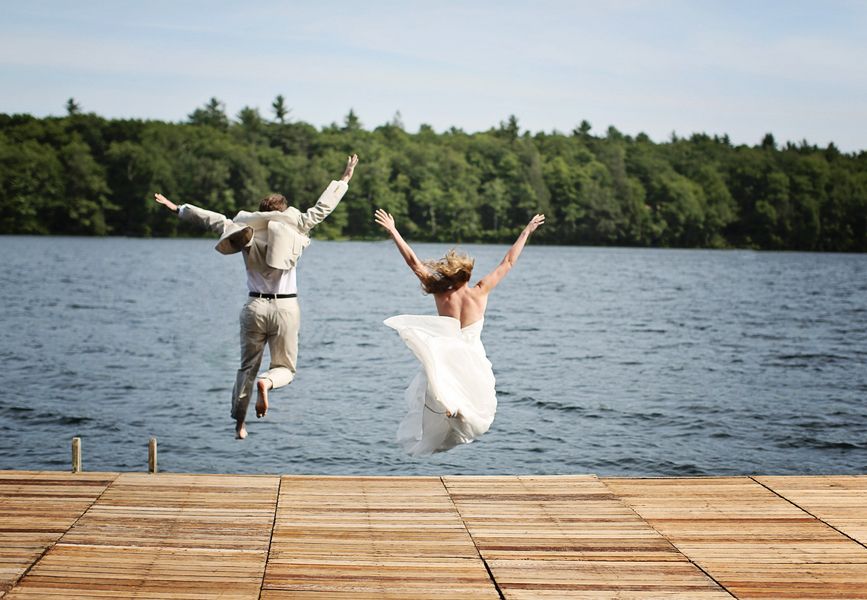 Bride & Groom Jumping In Lake