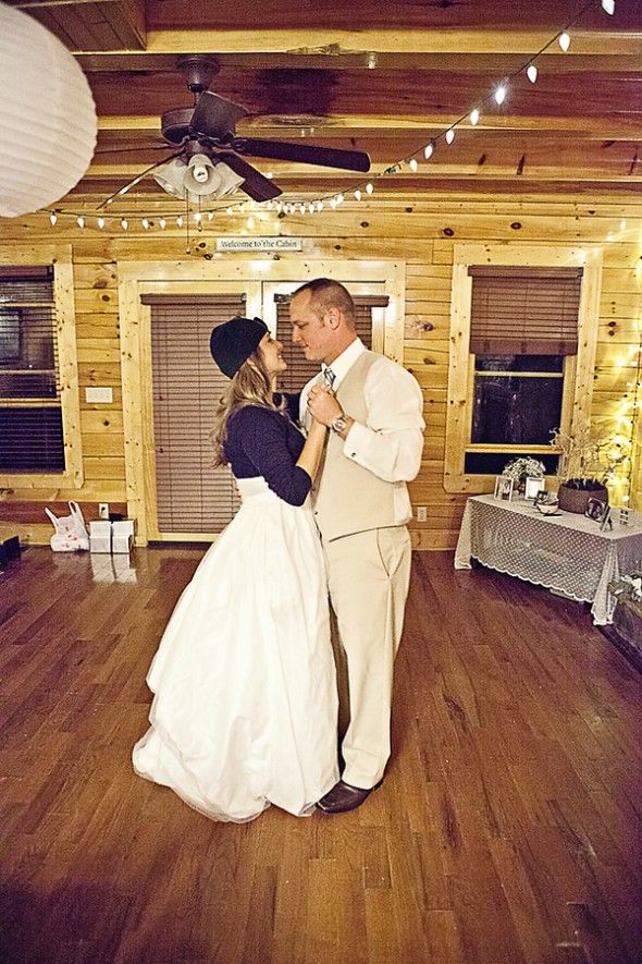 Country wedding bride + groom dancing