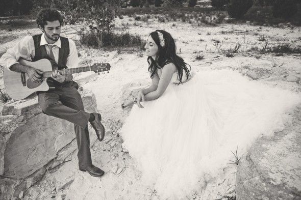 Vineyard wedding couple with guitar