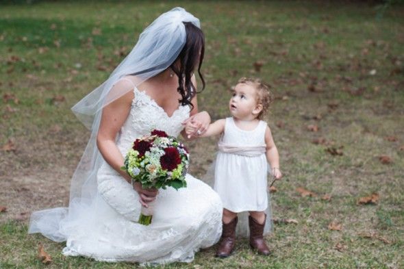 Baby in boots at wedding