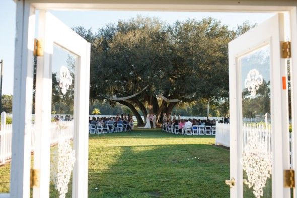 Country wedding outdoor ceremony with entry doors