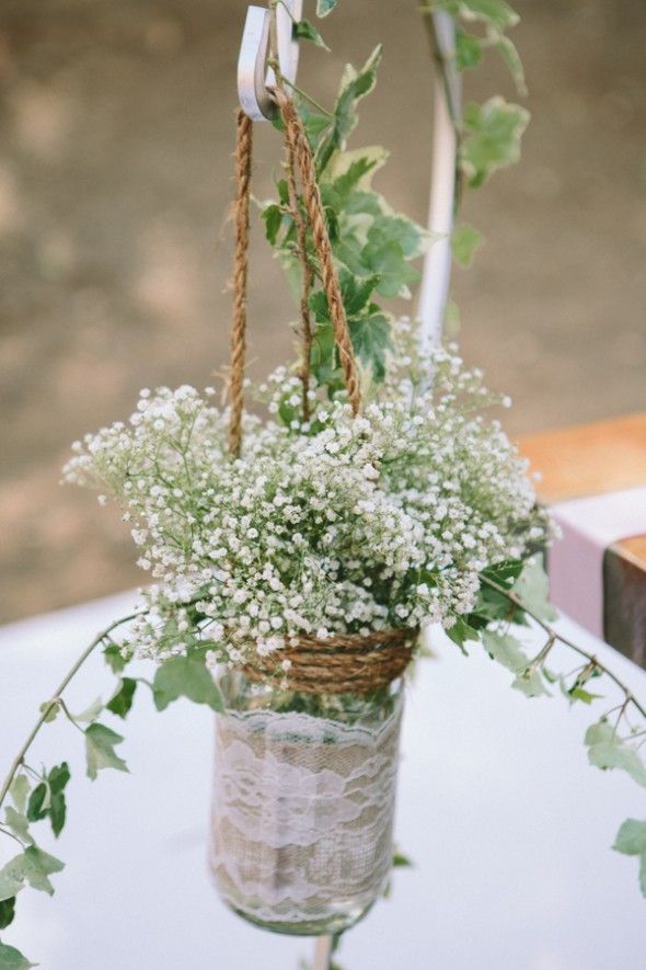 Hanging Flowers At A Rustic Wedding