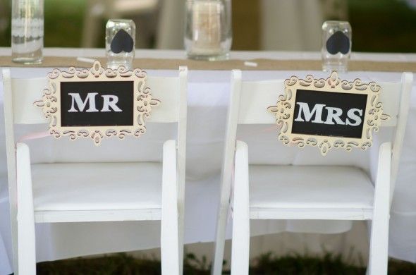 Me & Mrs Signs on Chairs at Wedding Reception