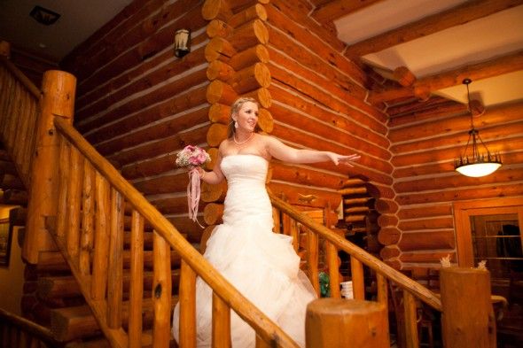 The Bride Throws the Bouquet from the Lodge Stairs