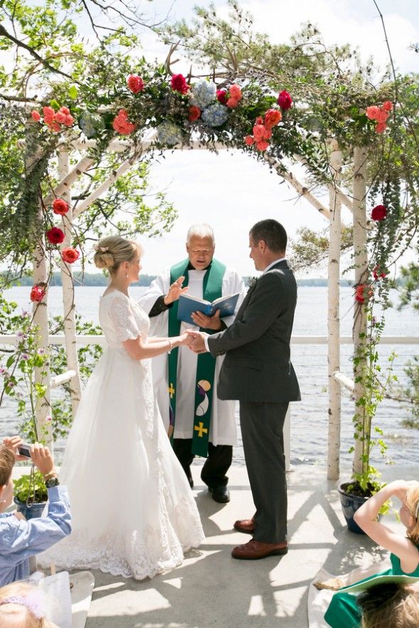 Exchanging Vows Lakeside under a Birch Arbor