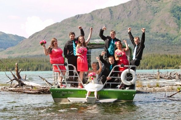 Bride + Groom and Wedding Party Leave by Boat