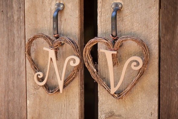 Initials Hang on the Door of a Wedding Barn
