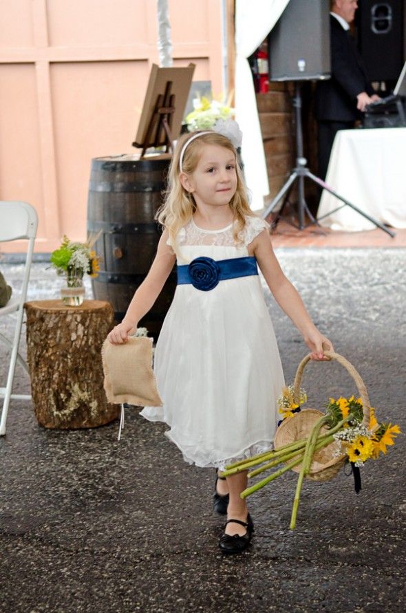 Flower Girl in White with Navy Sash and Sunflowers