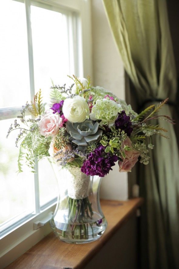 Purple and White Flowers and and Succulents in Bridal Bouquet
