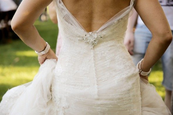 Brooch Sparkles on Back of Wedding Dress