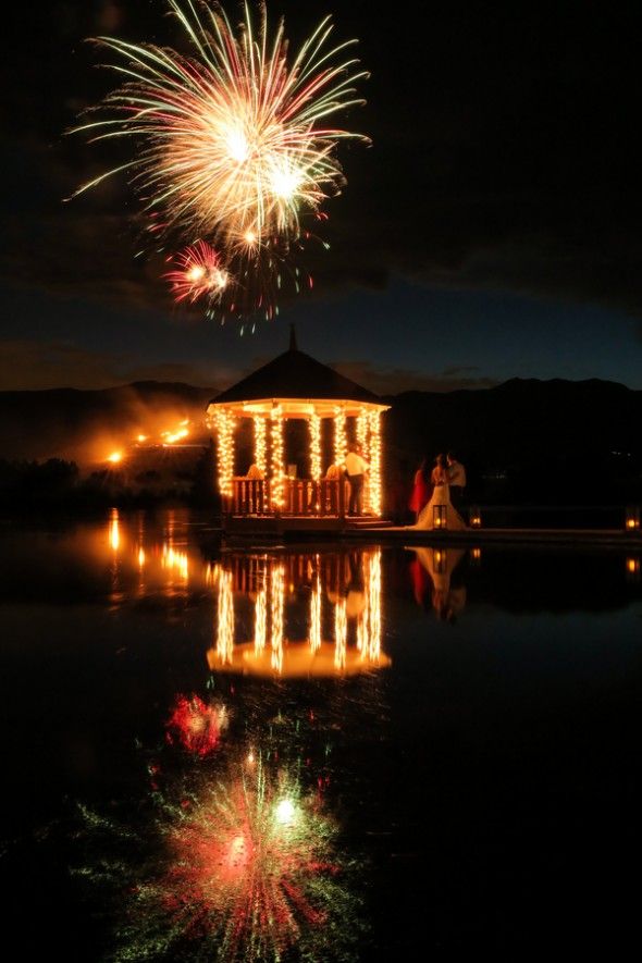 Fireworks Light Up An Outdoor Wedding Reception