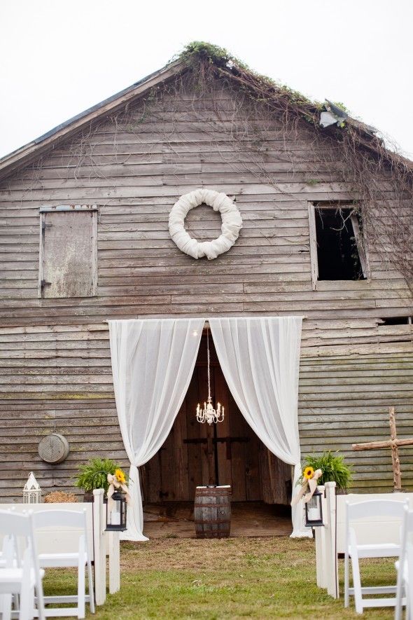 White Drapes For A Barn Wedding