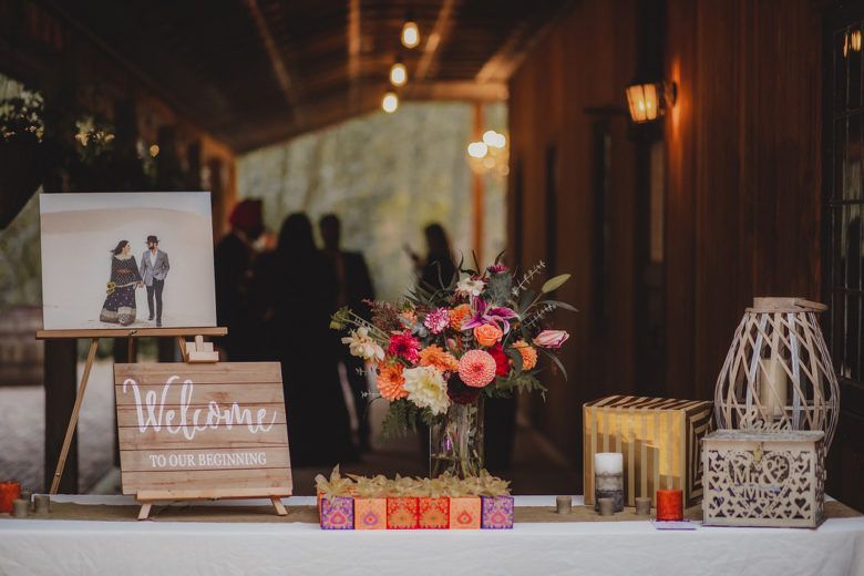wedding entry table with decor and favors
