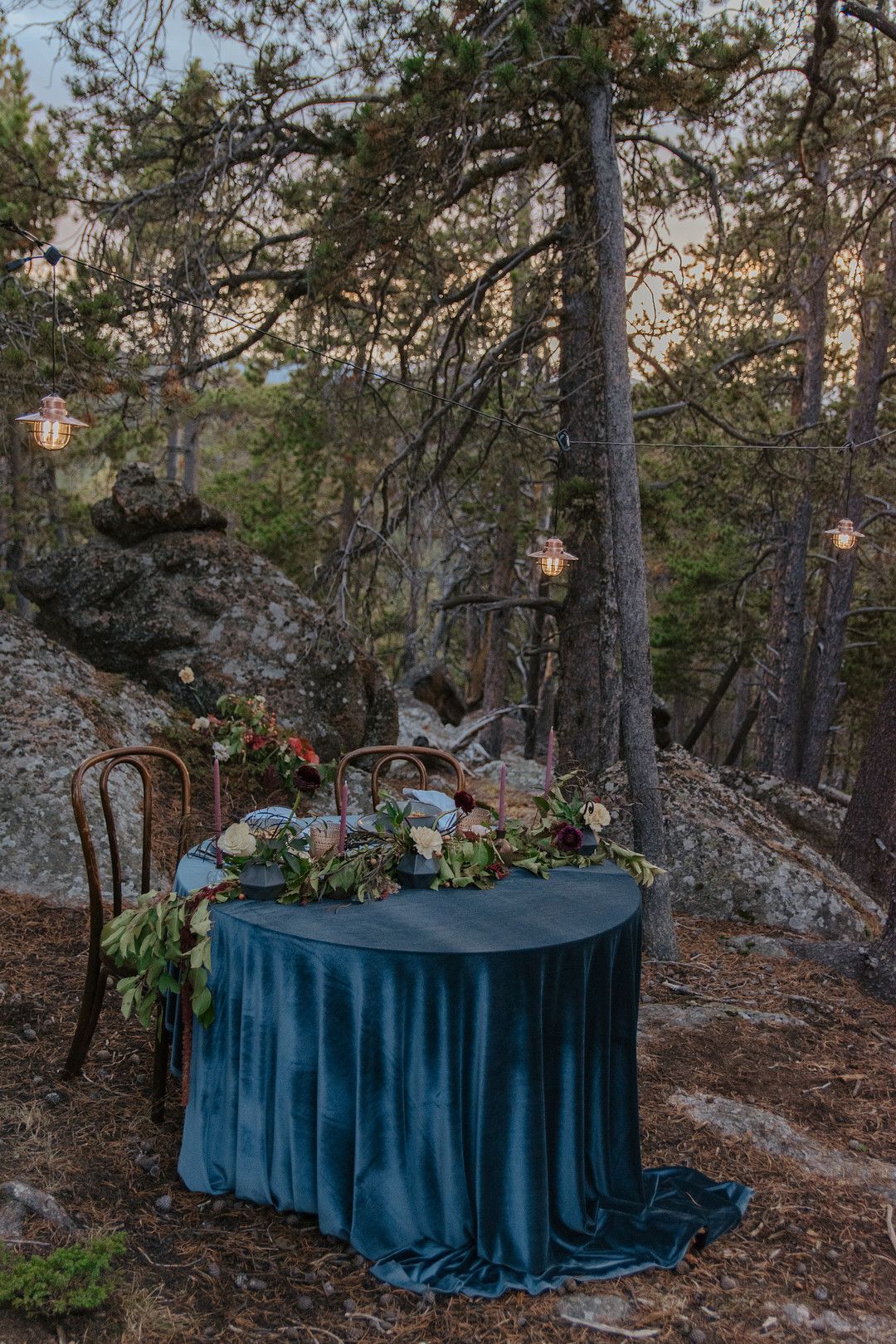 Wedding sweetheart table in the forest