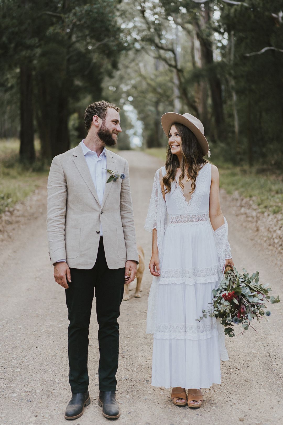 rustic country bride and groom standing next to each other 
