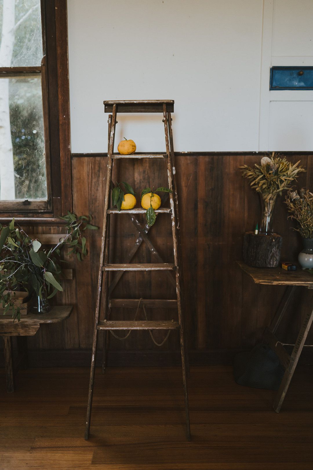 rustic wedding ladder with lemon decorations
