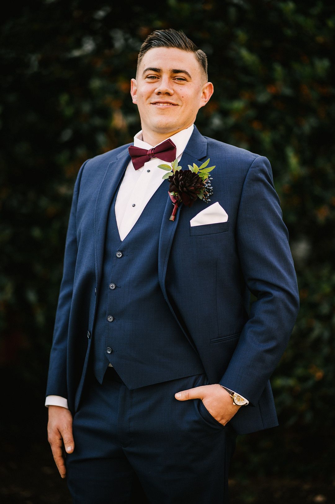 groom in navy suit