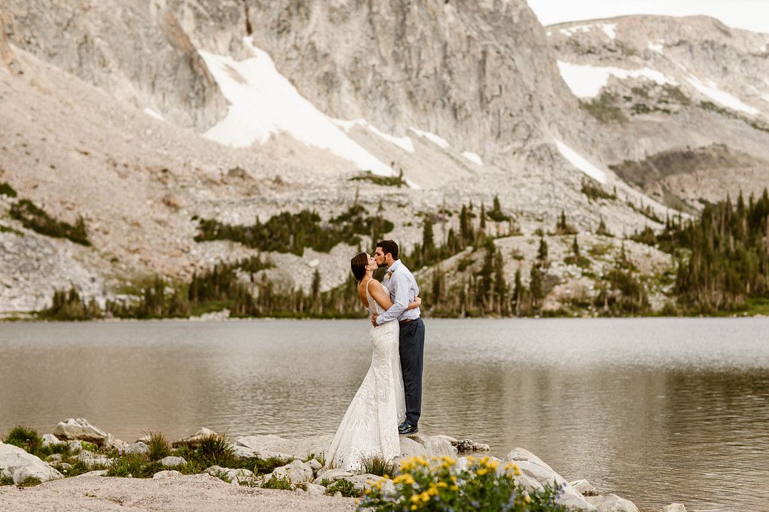 bride and groom kissing at their rustic western elopement 
