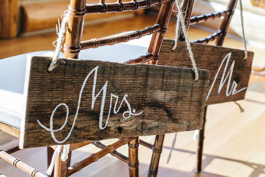 mrs. painted on wooden sign on the back of chair