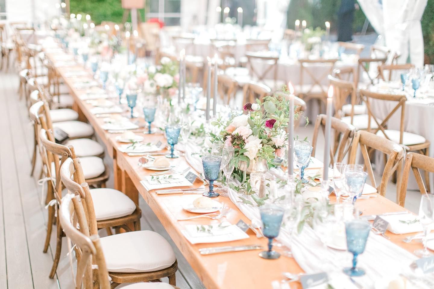 rustic wedding tablescape with blue glassware