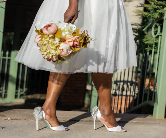 bride wearing sparkly wedding shoes
