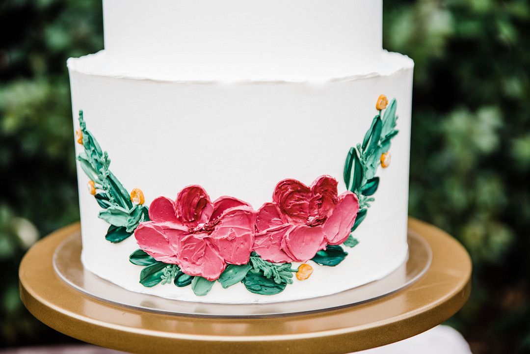 colorful petal themed wedding cake