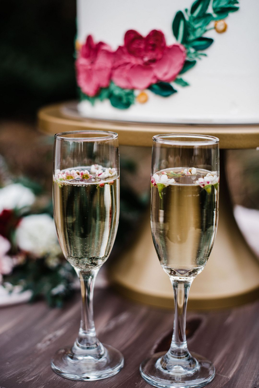bride and groom with champagne glasses