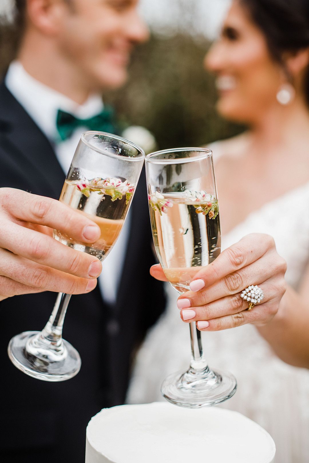 bride and groom with champagne glasses