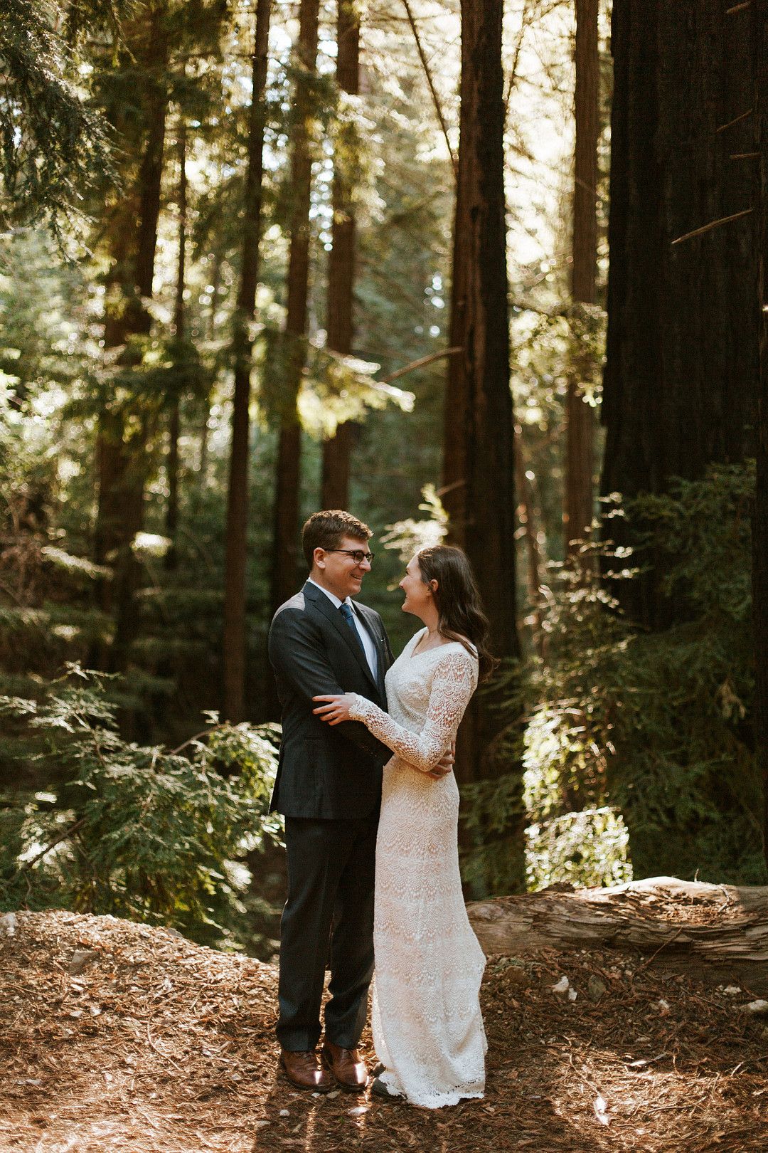 bride and groom in bug sur surrounded by redwoods