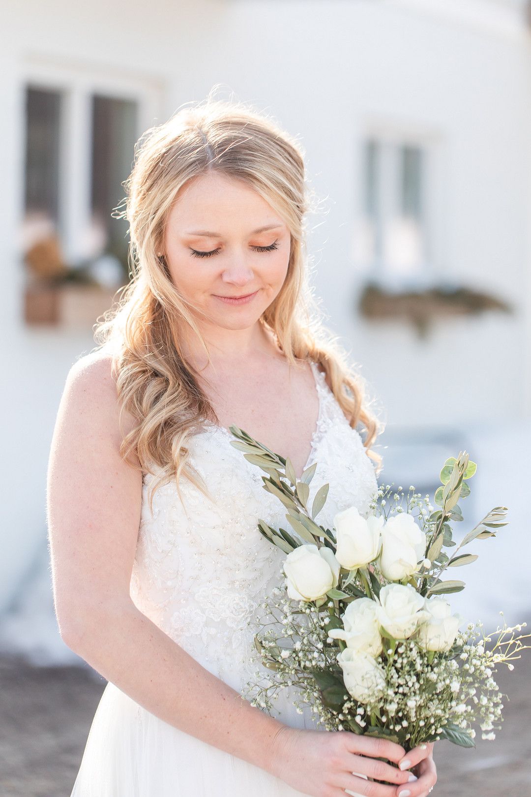 upclose image of bride holding flowers