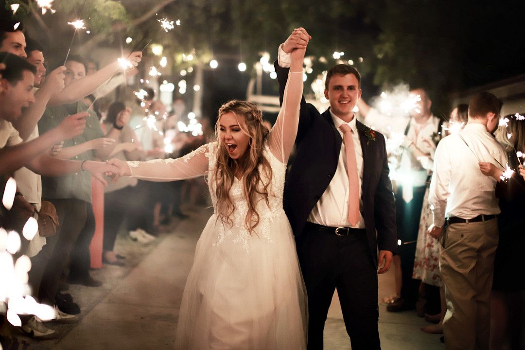 bride and groom send off with sparklers