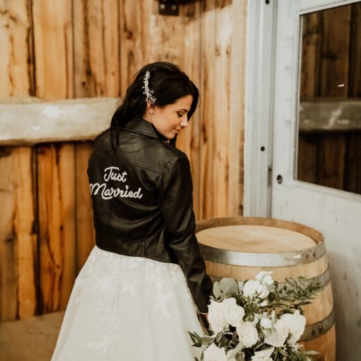 bride wearing bridal jacket