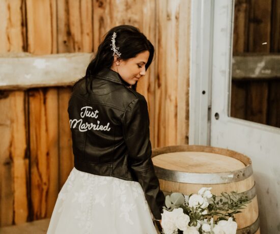 bride wearing bridal jacket