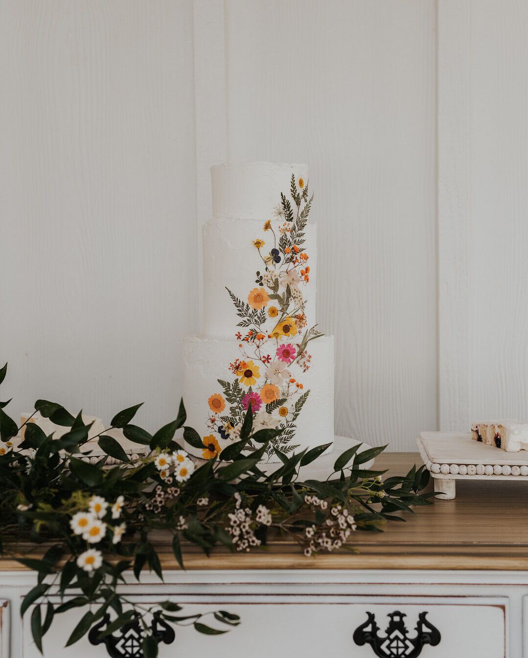 wedding cake with dried flower details in romantic wildflower inspiration shoot