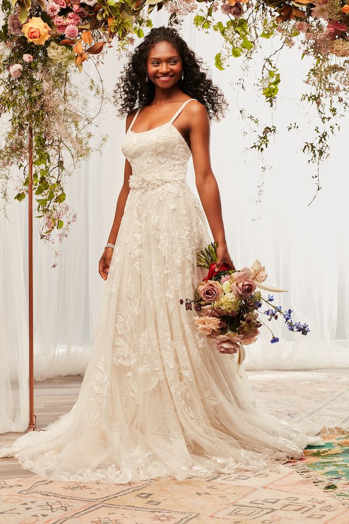 bride wearing 2021 fall boho wedding dress