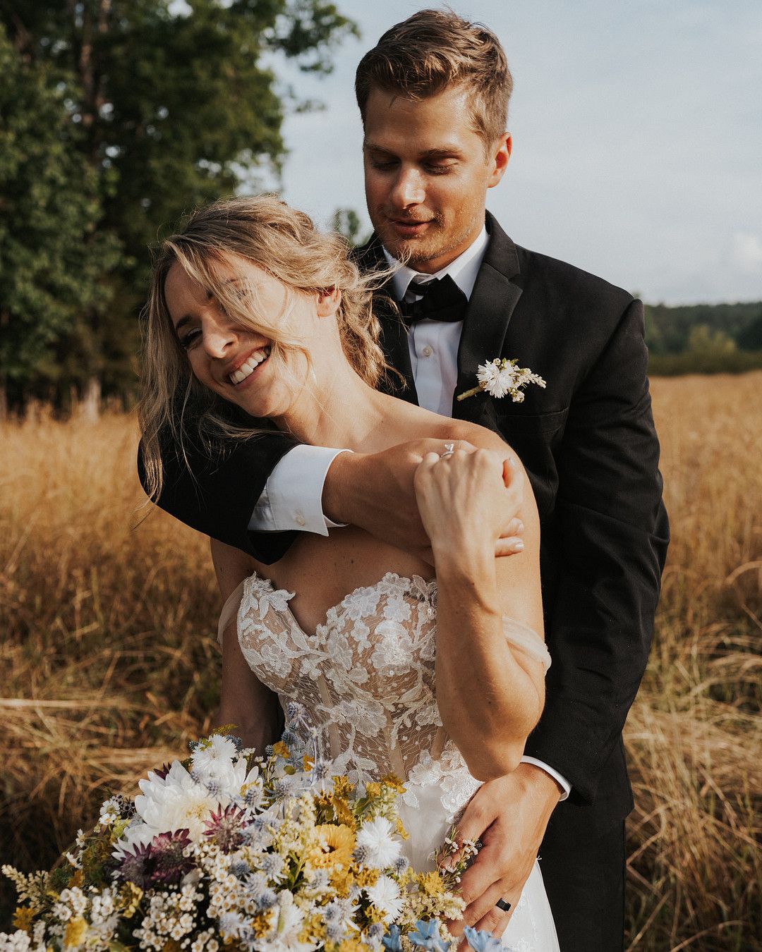 bride and groom in romantic wildflower inspiration shoot