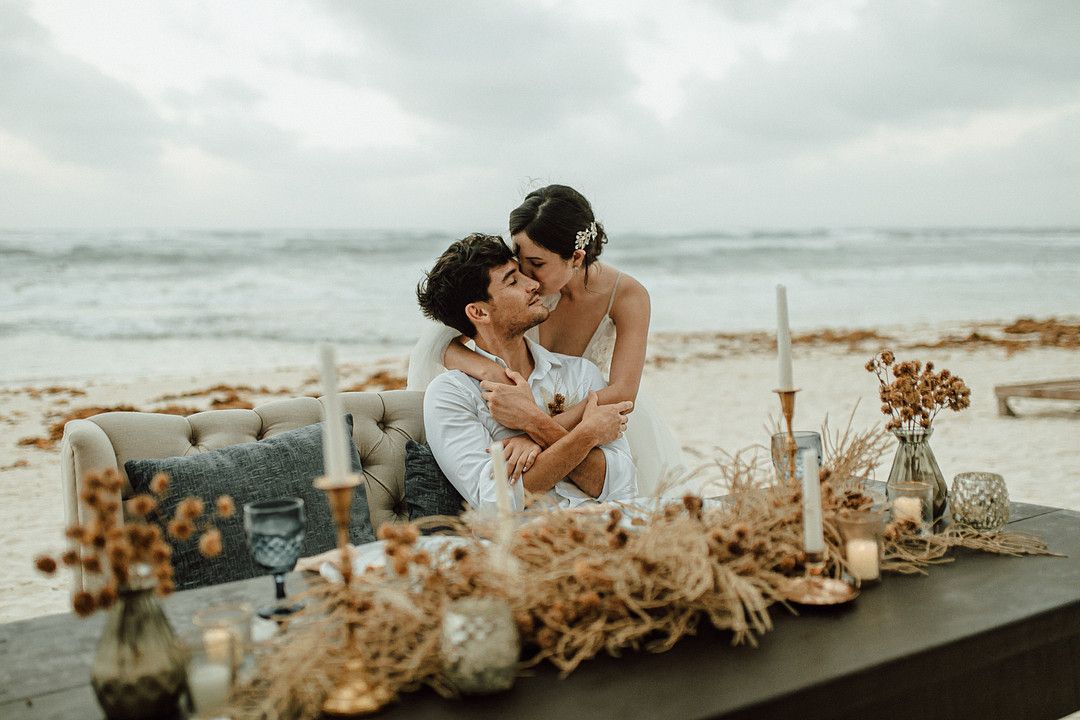 bride and groom embracing at elopement in tulum